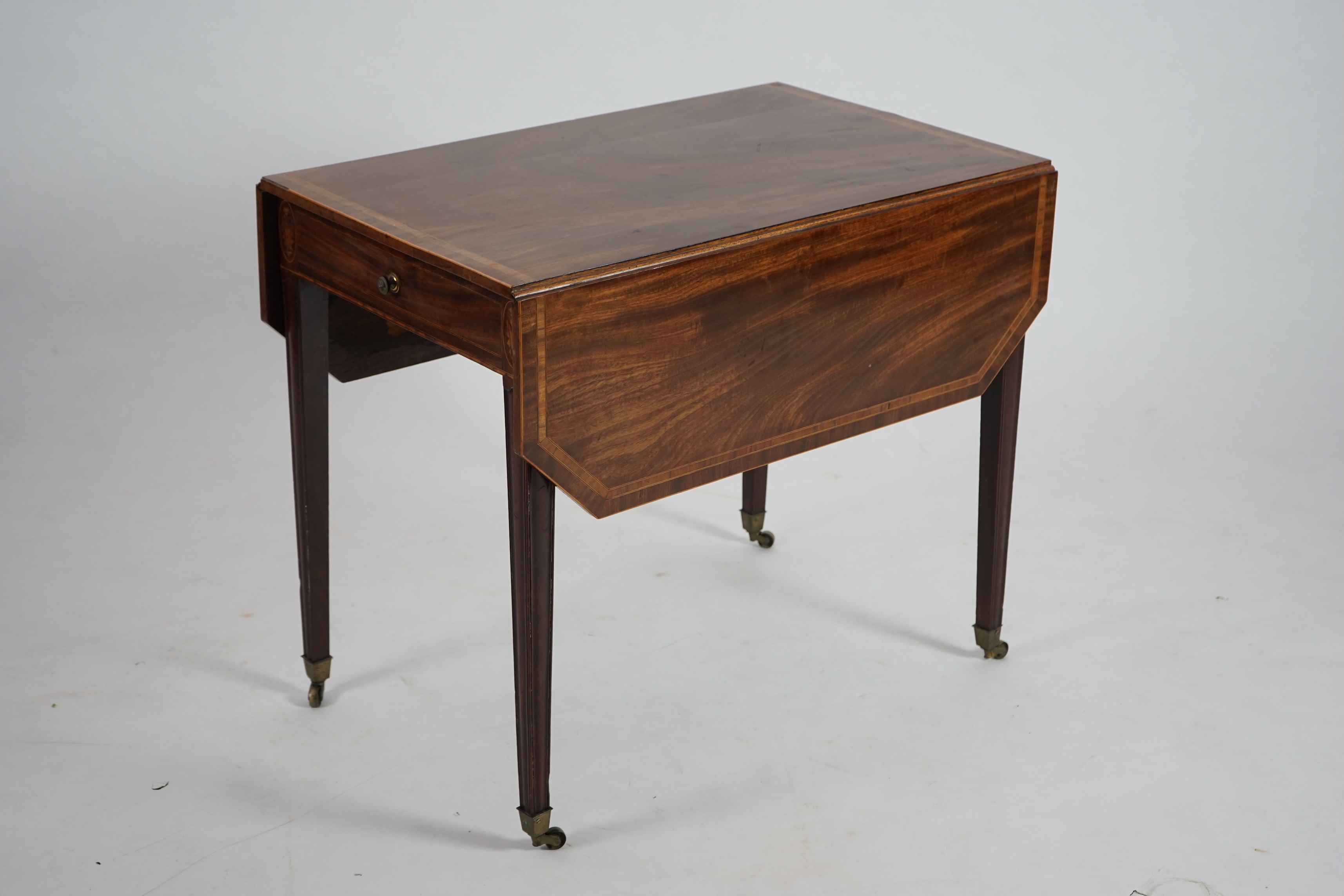 A George III crossbanded mahogany Pembroke table